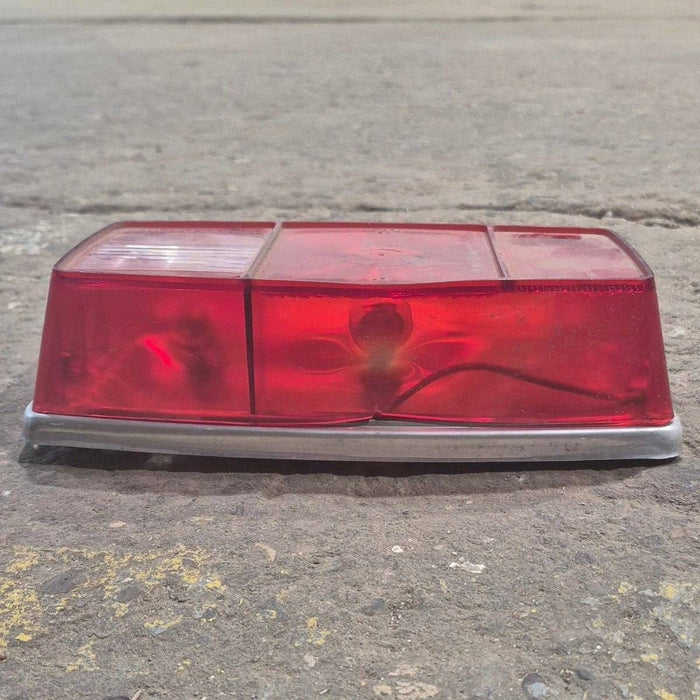 Used Miro-Flex RV Tail Light Assembly, With License Plate Bracket,  10 1/8" X 7" X 2 3/4" - 340