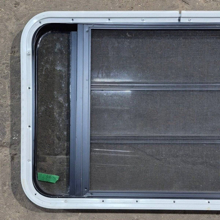 Used Black Radius Opening Window - 35 1/8" X 21 1/4" X 1 7/8"