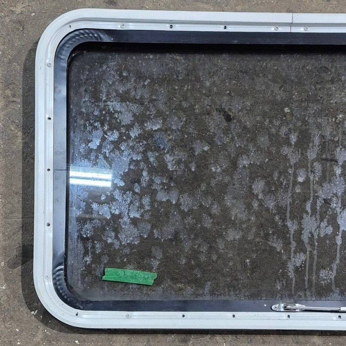 Used Black Radius Emergency Opening Window - 35 1/8" X 21 1/4" X 1 7/8"