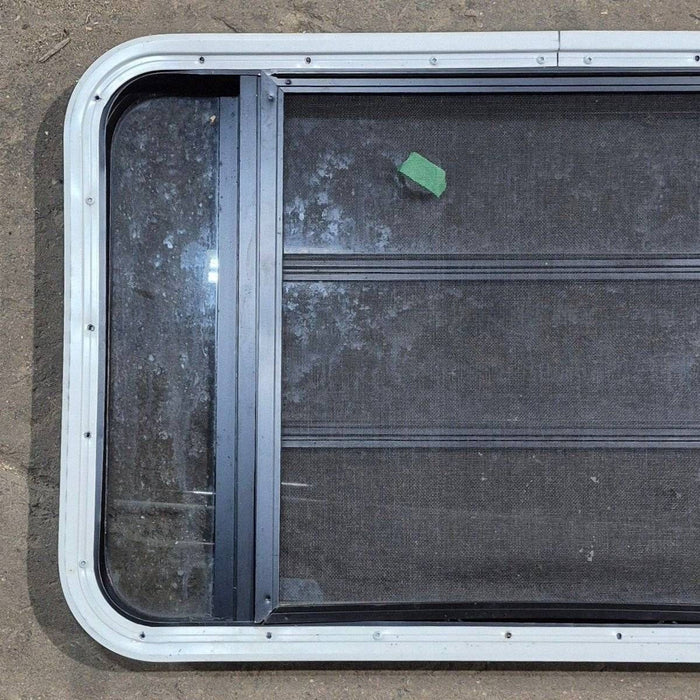 Used Black Radius Opening Window - 35 1/8" X 21 1/4" X 1 7/8"