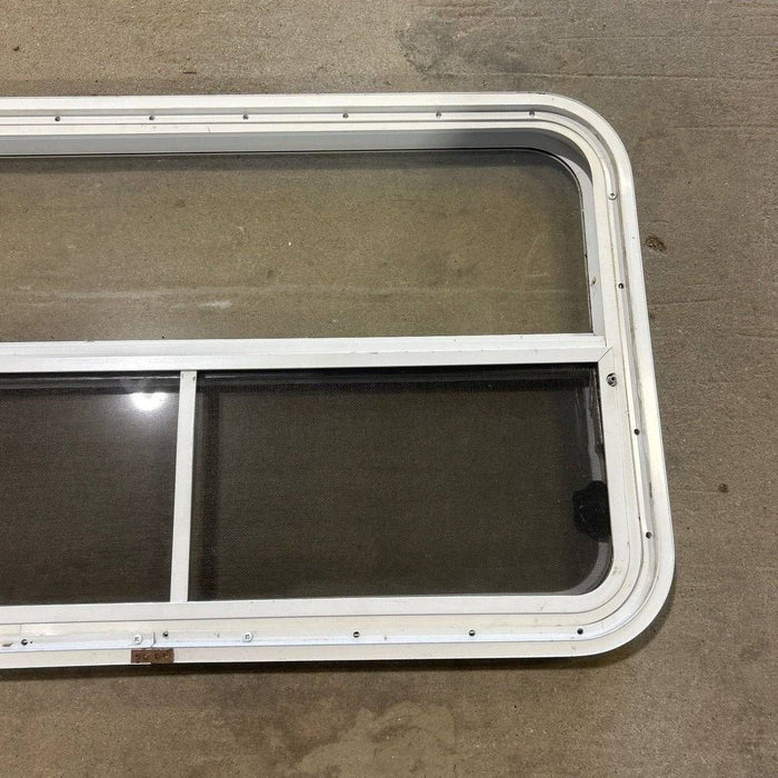 Used Slanted White Radius Opening Window - 49.25" x 23.25" x 1.875"