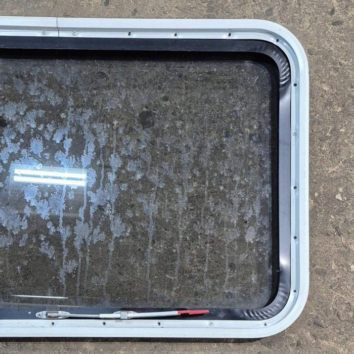 Used Black Radius Emergency Opening Window - 35 1/8" X 21 1/4" X 1 7/8"