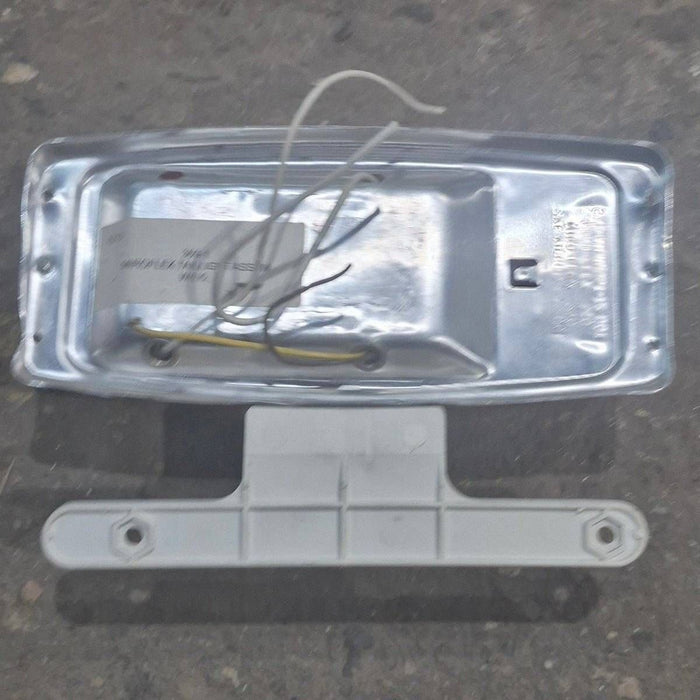Used Miro-Flex RV Tail Light Assembly, With License Plate Bracket,  10 1/8" X 7" X 2 3/4" - 340