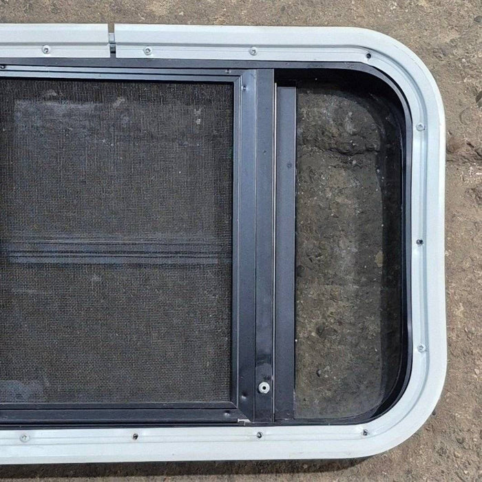 Used Black Radius Opening Window - 23 1/8" X 14 1/2" X 1 7/8"