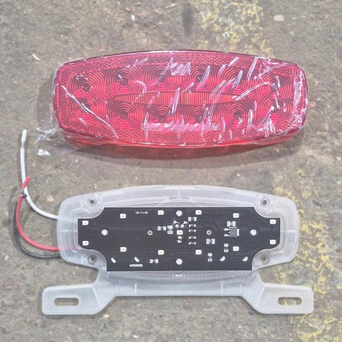 Used RV Tail Light Assembly, With License Plate Bracket, 8.625" x 4.125" x 1.25"- DOT SAE A2I6S2T2L 18