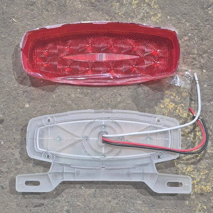 Used RV Tail Light Assembly, With License Plate Bracket, 8.625" x 4.125" x 1.25"- DOT SAE A2I6S2T2L 18