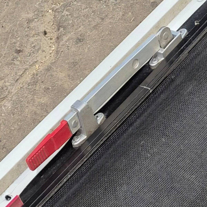 Used Black Radius Emergency Opening Window - 35 1/8" X 21 1/4" X 1 7/8"