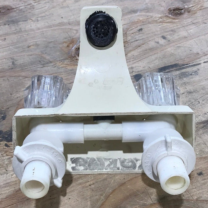 Used 4" Bathroom Faucet, Bone, Clear Knobs
