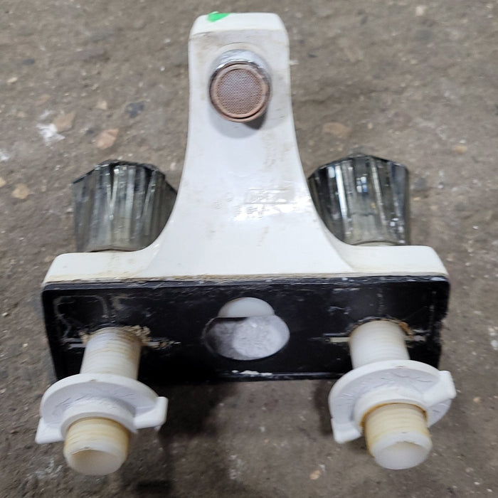 Used 4" Bathroom Faucet, Bone, Smoked Knobs