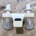 Used 4" Bathroom Faucet Bone - Young Farts RV Parts