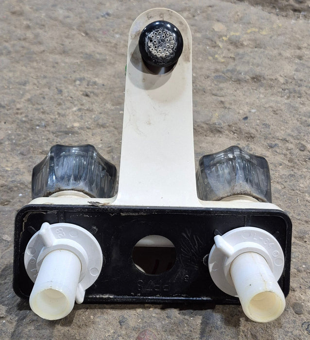 Used 4" Bathroom Faucet, Bone, Smoked Knobs