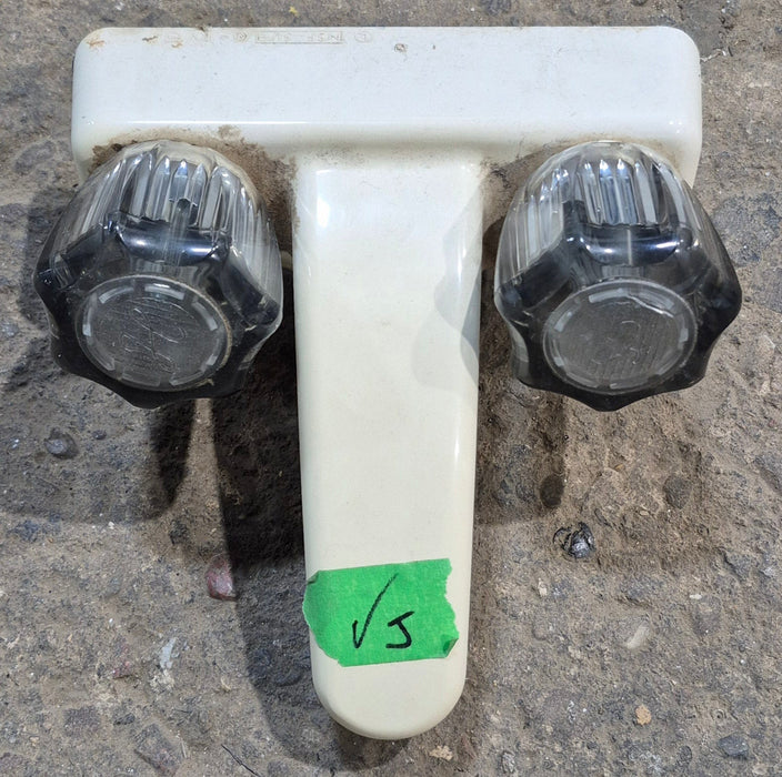 Used 4" Bathroom Faucet, Bone, Smoked Knobs