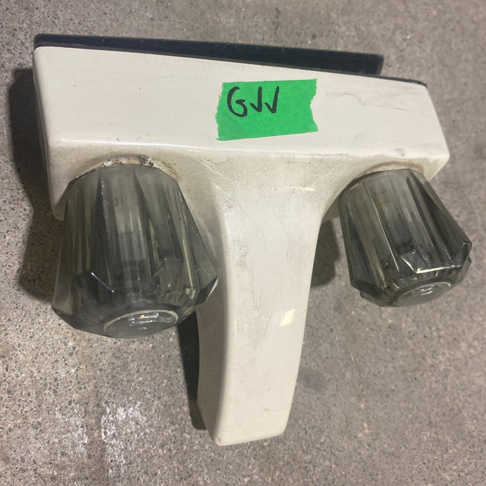 Used 4" Bathroom Faucet, Off White, Smoked Knobs