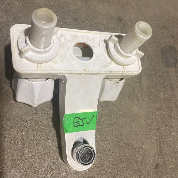Used 4" Bathroom Faucet, Off White, Off White Knobs