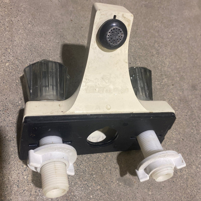 Used 4" Bathroom Faucet, Off White, Smoked Knobs