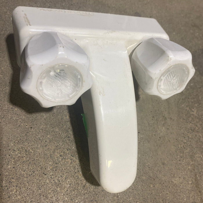 Used 4" Bathroom Faucet, Off White, Off White Knobs