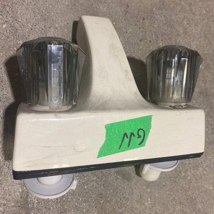 Used 4" Bathroom Faucet, Off White, Smoked Knobs