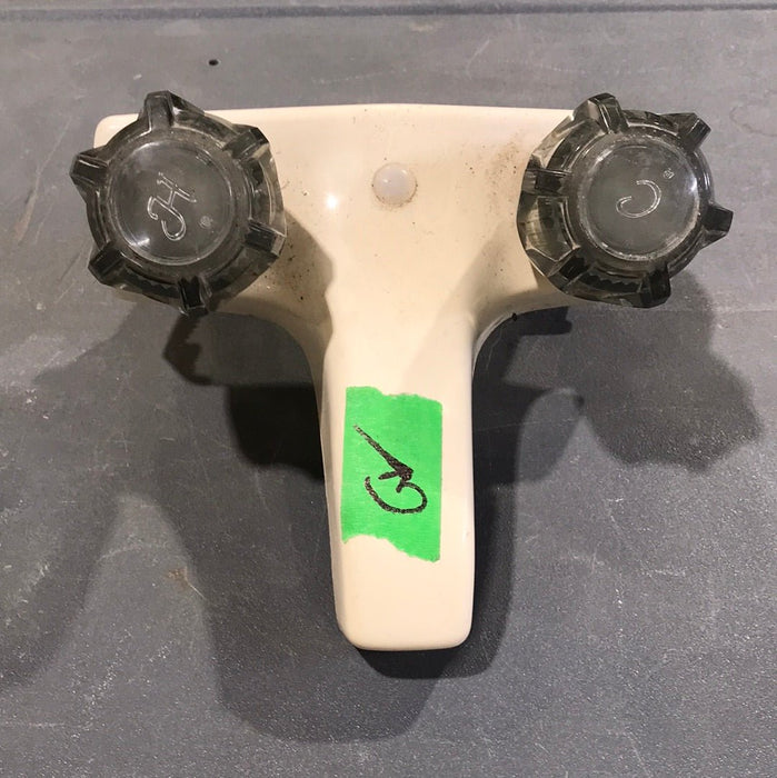 Used 4" Bathroom Faucet, Bone, Smoked Knobs