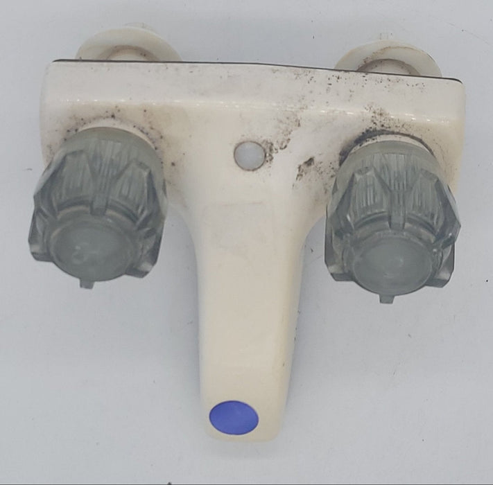 Used 4" Bathroom Faucet, Bone, Smoked Knobs