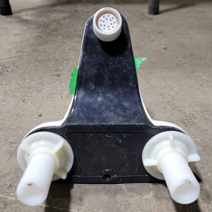 Used 4" Bathroom Faucet, White, Clear Knob