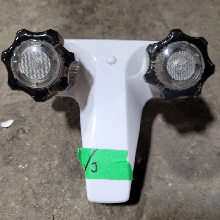 Used 4" Bathroom Faucet, White, Smoked Knobs