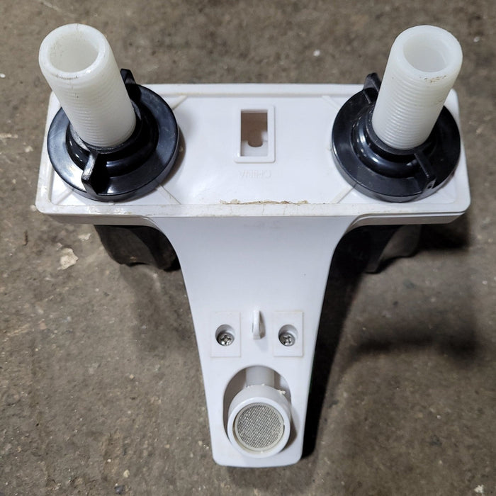 Used 4" Bathroom Faucet, White, Smoked Knobs