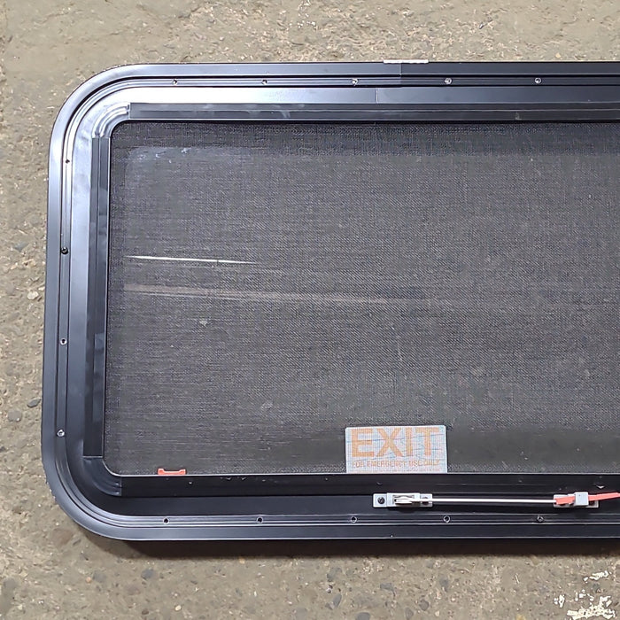 Used Black Radius Emergency Opening Window : 29 1/2" W x 19 1/2" H x 1 3/4" D - Young Farts RV Parts