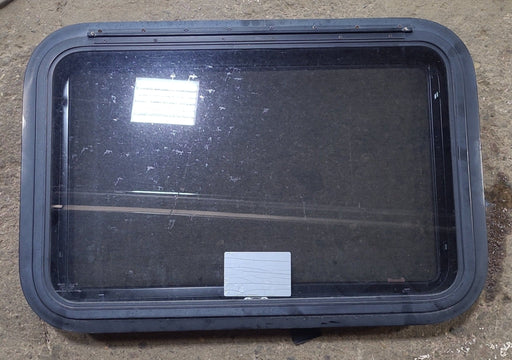 Used Black Radius Emergency Opening Window : 29 1/2" W x 19 1/2" H x 1 3/4" D - Young Farts RV Parts