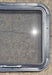 Used Black Radius Emergency Opening Window : 29 1/2" W x 21 1/2" H x 1 1/2" - Young Farts RV Parts