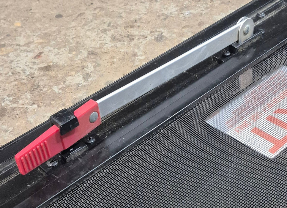 Used Black Radius Emergency Opening Window : 29 1/2" W x 21 1/2" H x 1 3/4"