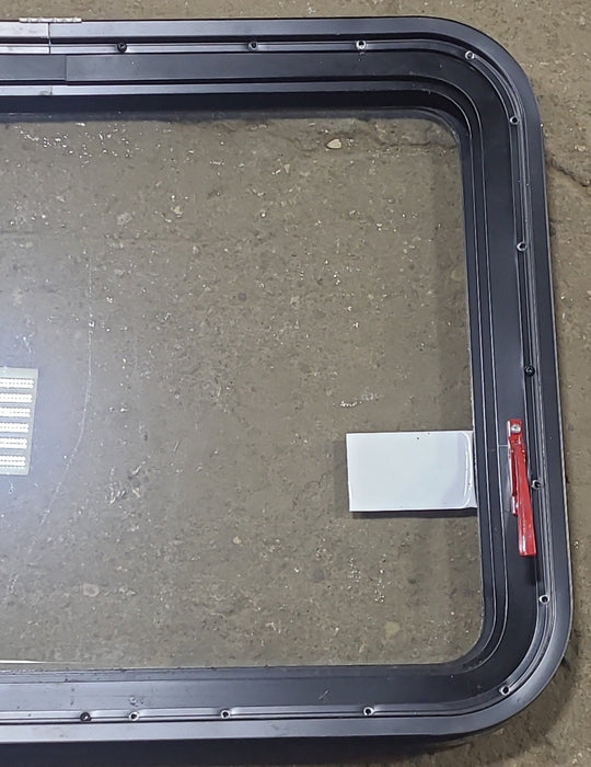 Used Black Radius Emergency Opening Window : 29 1/2" W x 21 1/2" H x 1 3/8" D