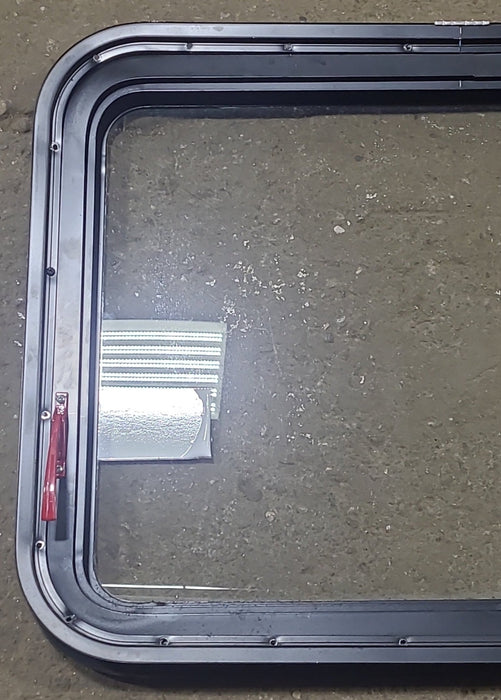 Used Black Radius Emergency Opening Window : 29 1/2" W x 21 1/2" H x 1 3/8" D