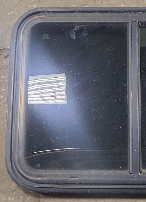 Used Black Radius Emergency Opening Window : 29 1/2" W x 21 1/2" H x 1 7/8" D - Young Farts RV Parts