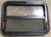 Used Black Radius Emergency Opening Window : 29 1/2" W x 21 1/2" H x 1 7/8" D - Young Farts RV Parts
