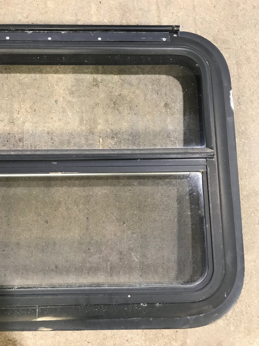 Used Black Radius Emergency Opening Window : 29 1/2" W x 21 1/2" H x 1 7/8" D - Young Farts RV Parts