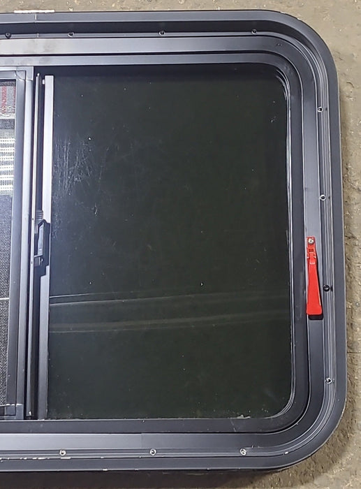 Used Black Radius Emergency Opening Window : 29 1/2" W x 21 1/2" H x 2" D - Young Farts RV Parts