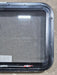 Used Black Radius Emergency Opening Window : 29 1/4" W x 19 1/4" H x 1 3/8" D - Young Farts RV Parts