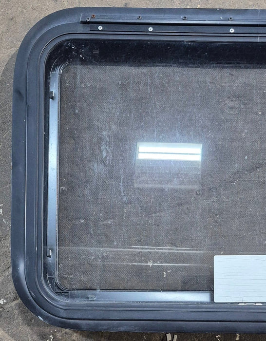 Used Black Radius Emergency Opening Window : 29 1/4" W x 19 1/4" H x 1 3/8" D - Young Farts RV Parts