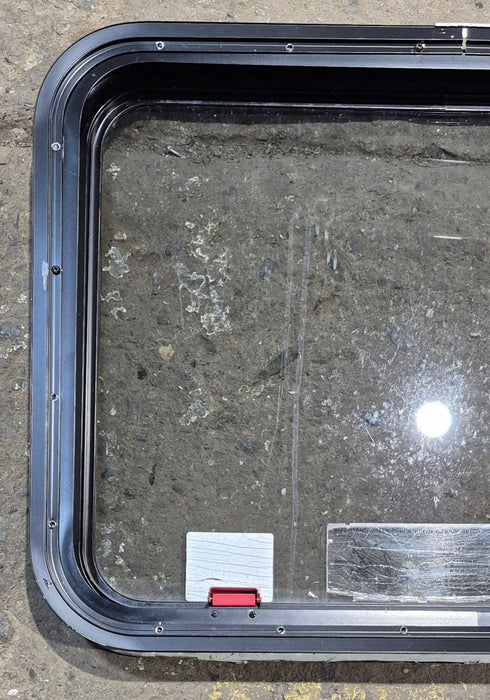 Used Black Radius Emergency Opening Window : 29 1/4" W x 21 1/2" H x 1 3/4"