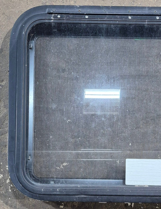 Used Black Radius Emergency Opening Window : 29 1/4" W x 21 1/4" H x 1 1/4" D