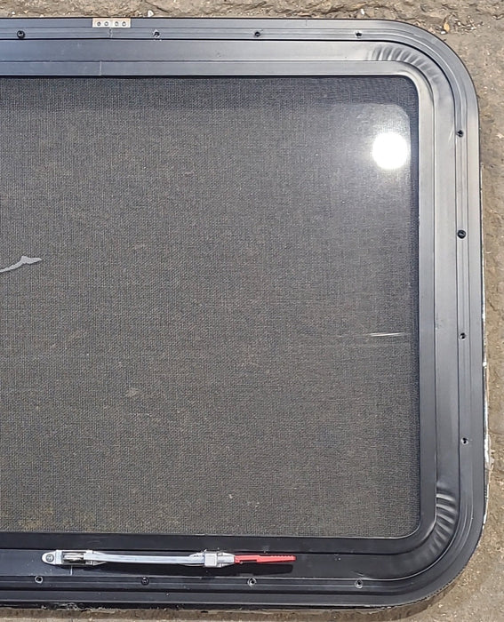 Used Black Radius Emergency Opening Window : 29 1/4" W x 21 1/4" H x 1 1/4" D