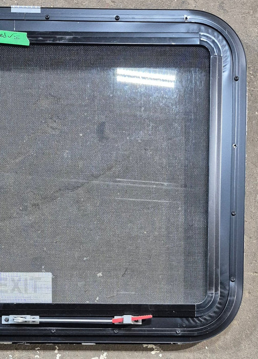 Used Black Radius Emergency Opening Window : 29 1/4" W x 21 1/4" H x 1 1/4" D