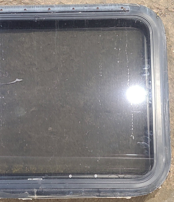 Used Black Radius Emergency Opening Window : 29 1/4" W x 21 1/4" H x 1 1/4" D