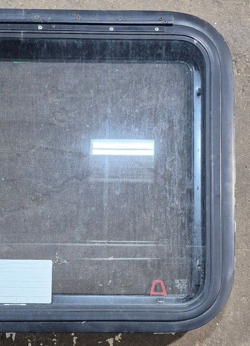 Used Black Radius Emergency Opening Window : 29 1/4" W x 21 1/4" H x 1 1/4" D