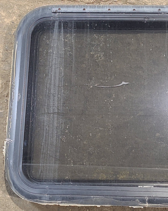 Used Black Radius Emergency Opening Window : 29 1/4" W x 21 1/4" H x 1 1/4" D
