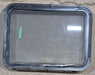 Used Black Radius Emergency Opening Window : 29 1/4" W x 21 1/4" H x 1 7/8" D - Young Farts RV Parts