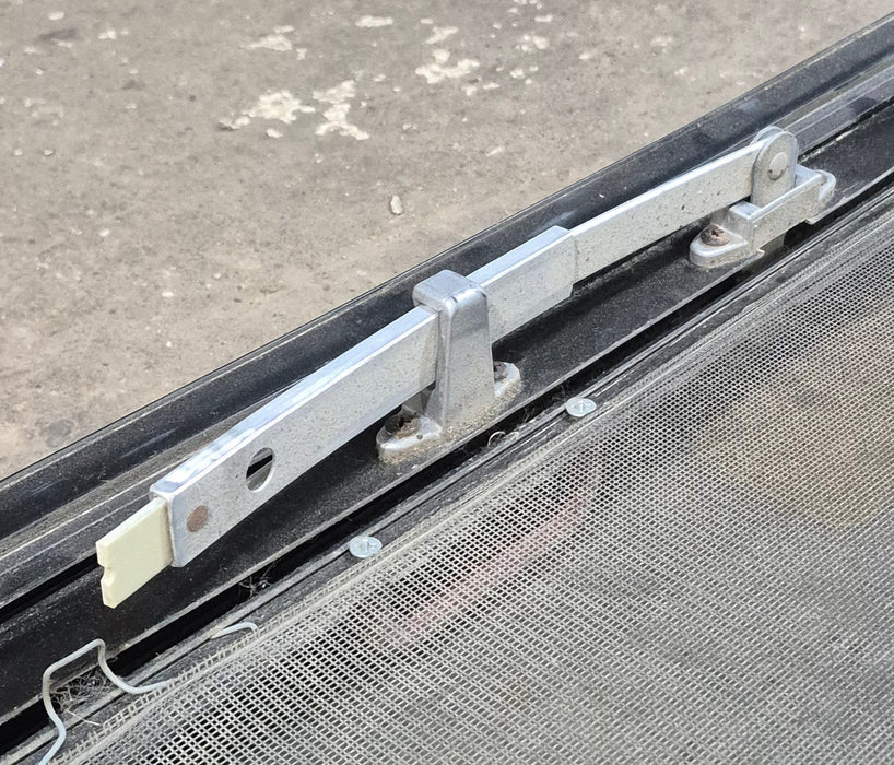 Used Black Radius Emergency Opening Window : 29 1/4" W x 21 1/4" H x 1 7/8" D - Young Farts RV Parts