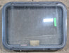 Used Black Radius Emergency Opening Window : 29 1/4" W x 21 1/4" H x 1 7/8" D - Young Farts RV Parts