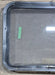 Used Black Radius Emergency Opening Window : 29 1/4" W x 21 1/4" H x 1 7/8" D - Young Farts RV Parts