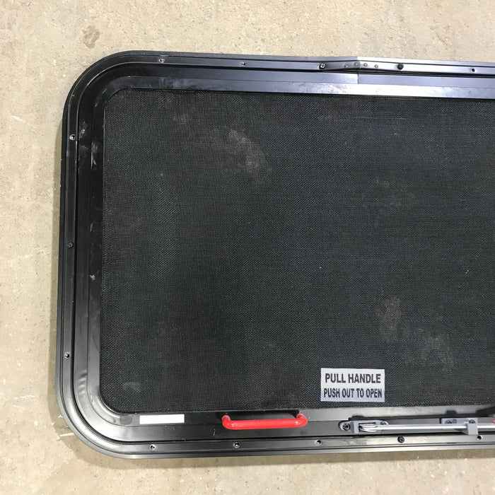 Used Black Radius Emergency Opening Window : 29.5" X 19.5" X 1.5"